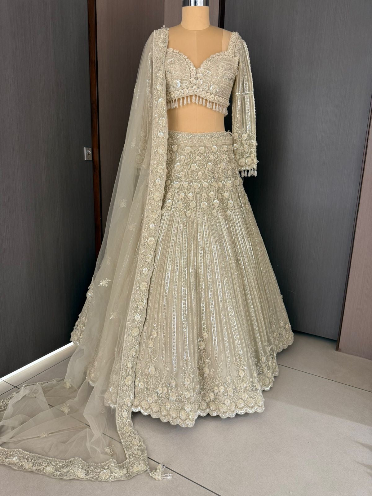 Nyraa Ivory & Gold Embroidered Lehenga Choli Set
