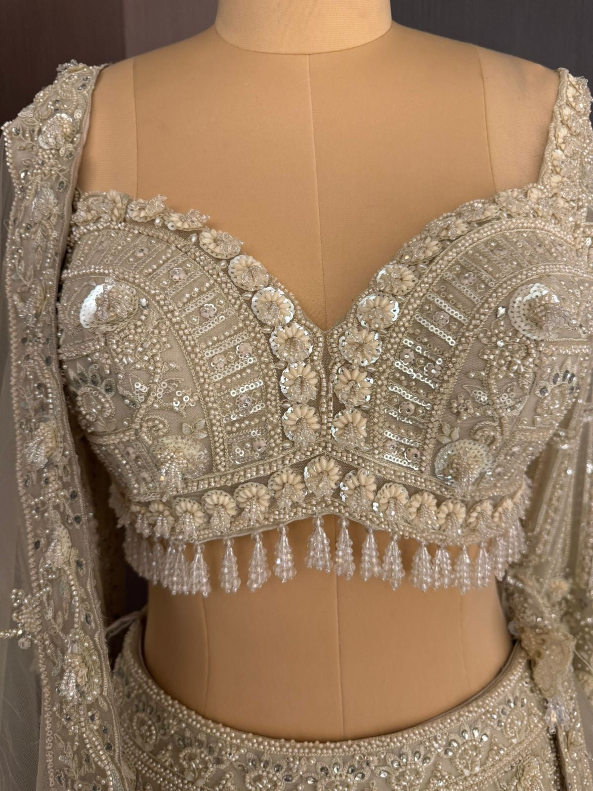 Nyraa Ivory & Gold Embroidered Lehenga Choli Set