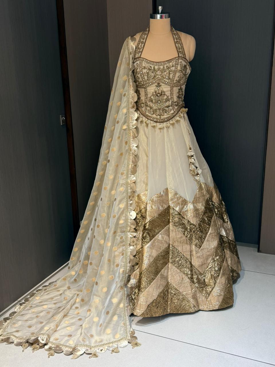 Nyraa Gold & Ivory Embroidered Lehenga Choli