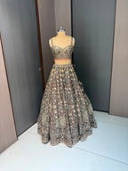 Nyraa Banarasi Silk Black & Gold Embroidered Lehenga