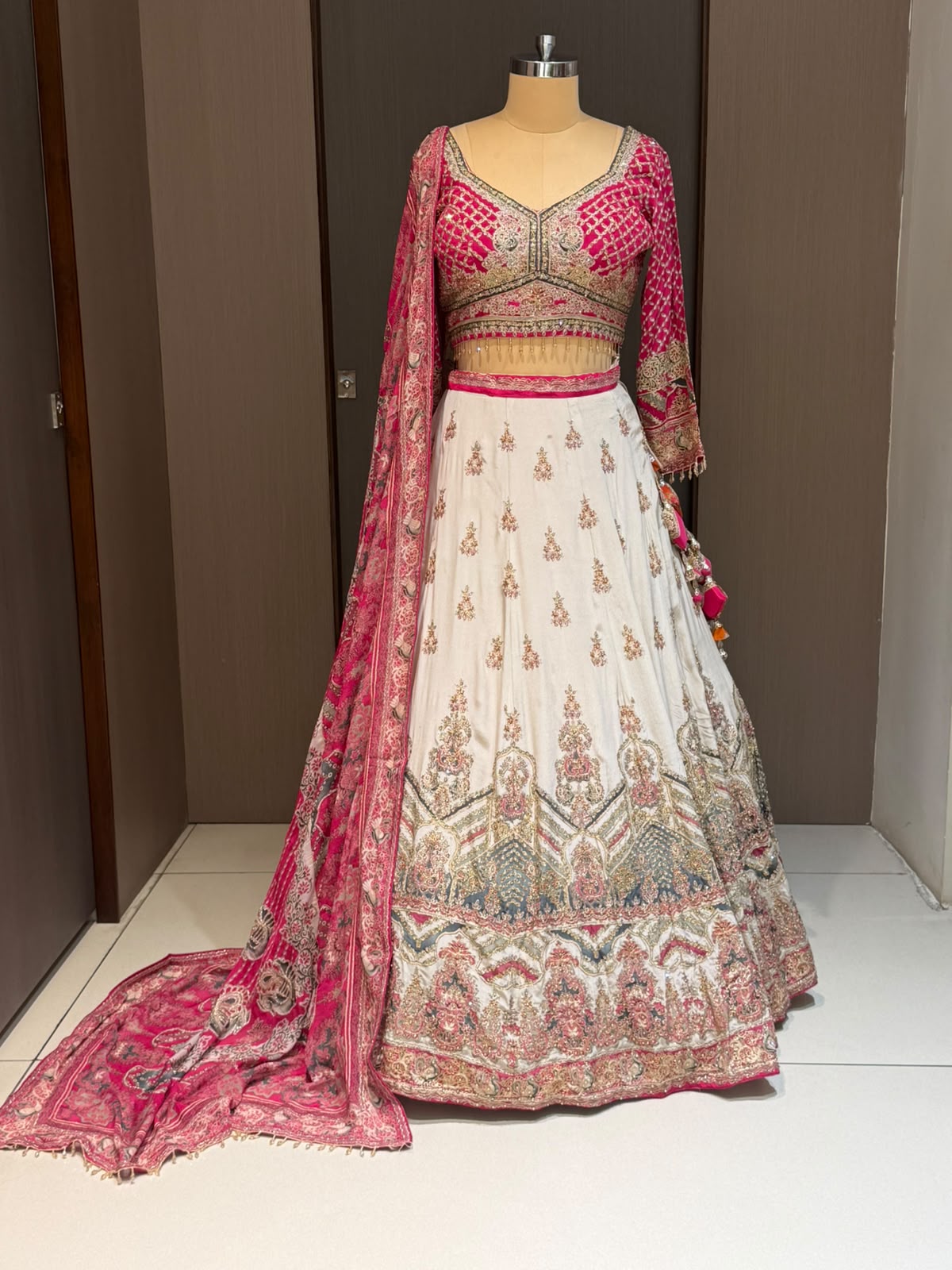 Nyraa Cream & Bright Pink Embroidered Lehenga Choli Set