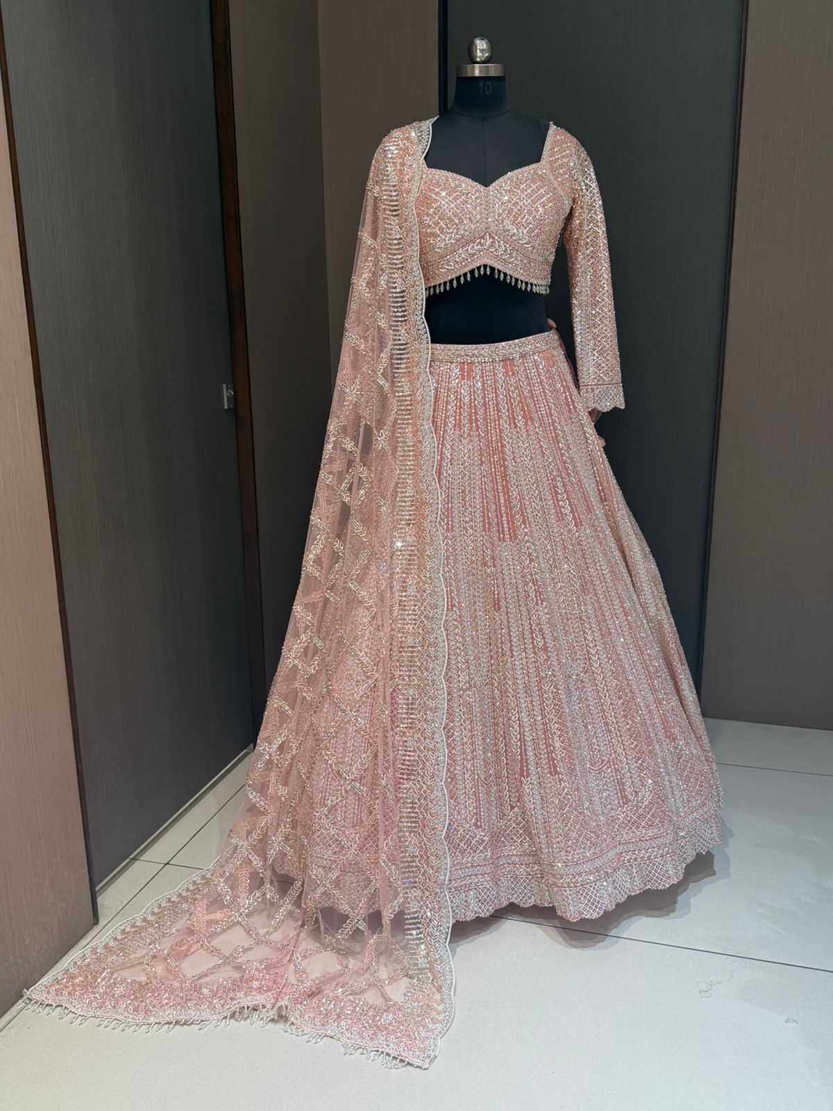 Nyraa Peach Pink Embroidered Lehenga Choli