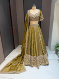 Nyraa Mehendi Green Embroidered Lehenga Choli