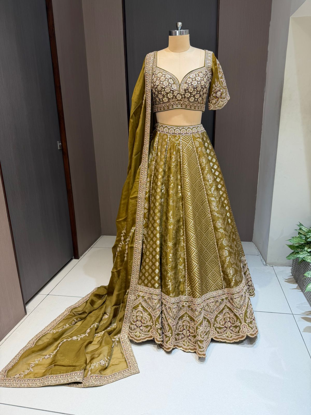 Nyraa Mehendi Green Embroidered Lehenga Choli