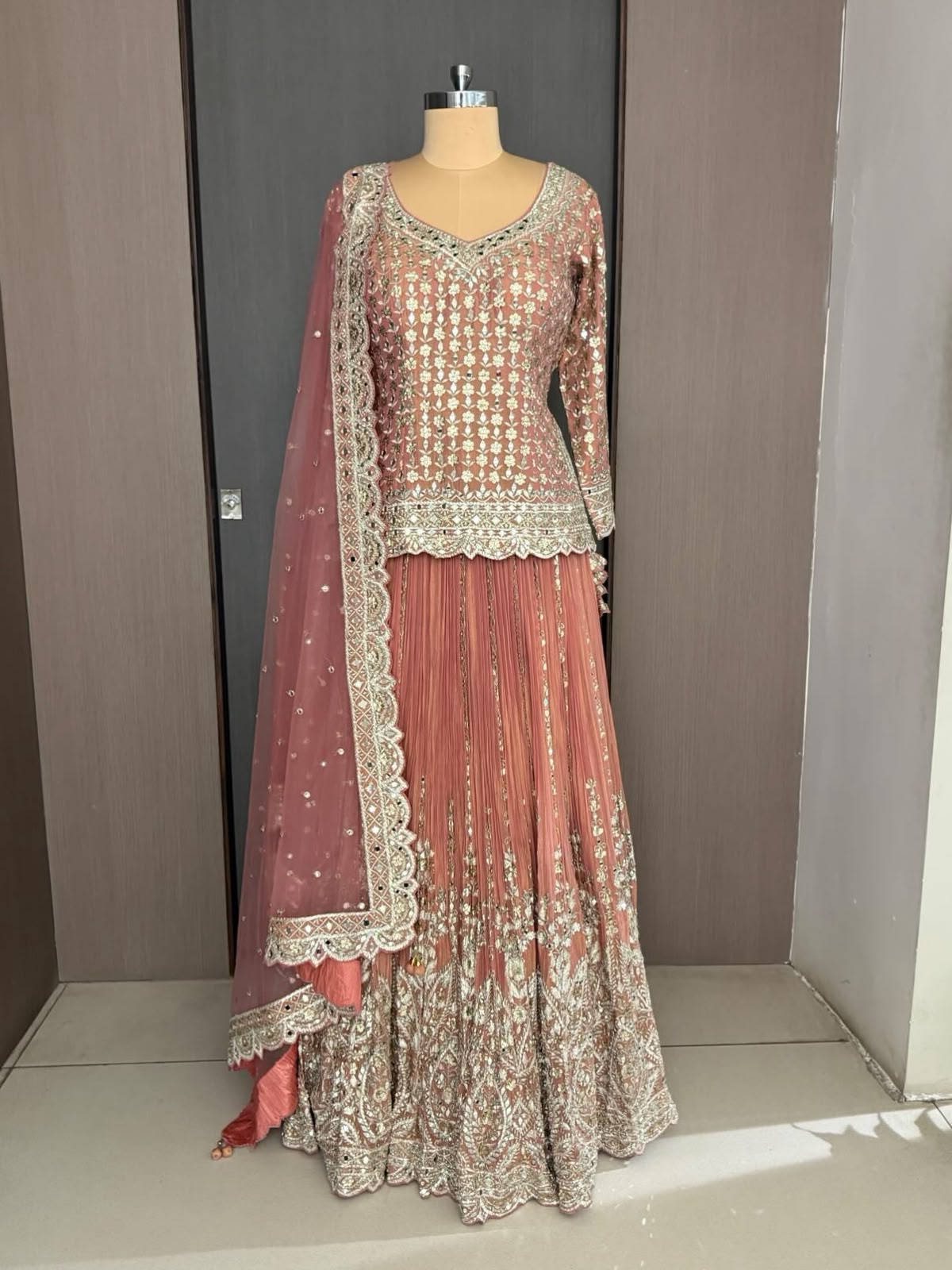 Nyraa Peach Embroidered Lehenga with Long Choli