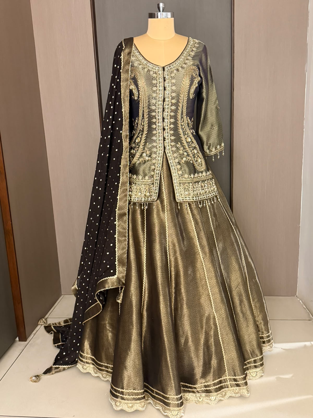 Nyraa Golden Black Lehenga with Embroidered Jacket