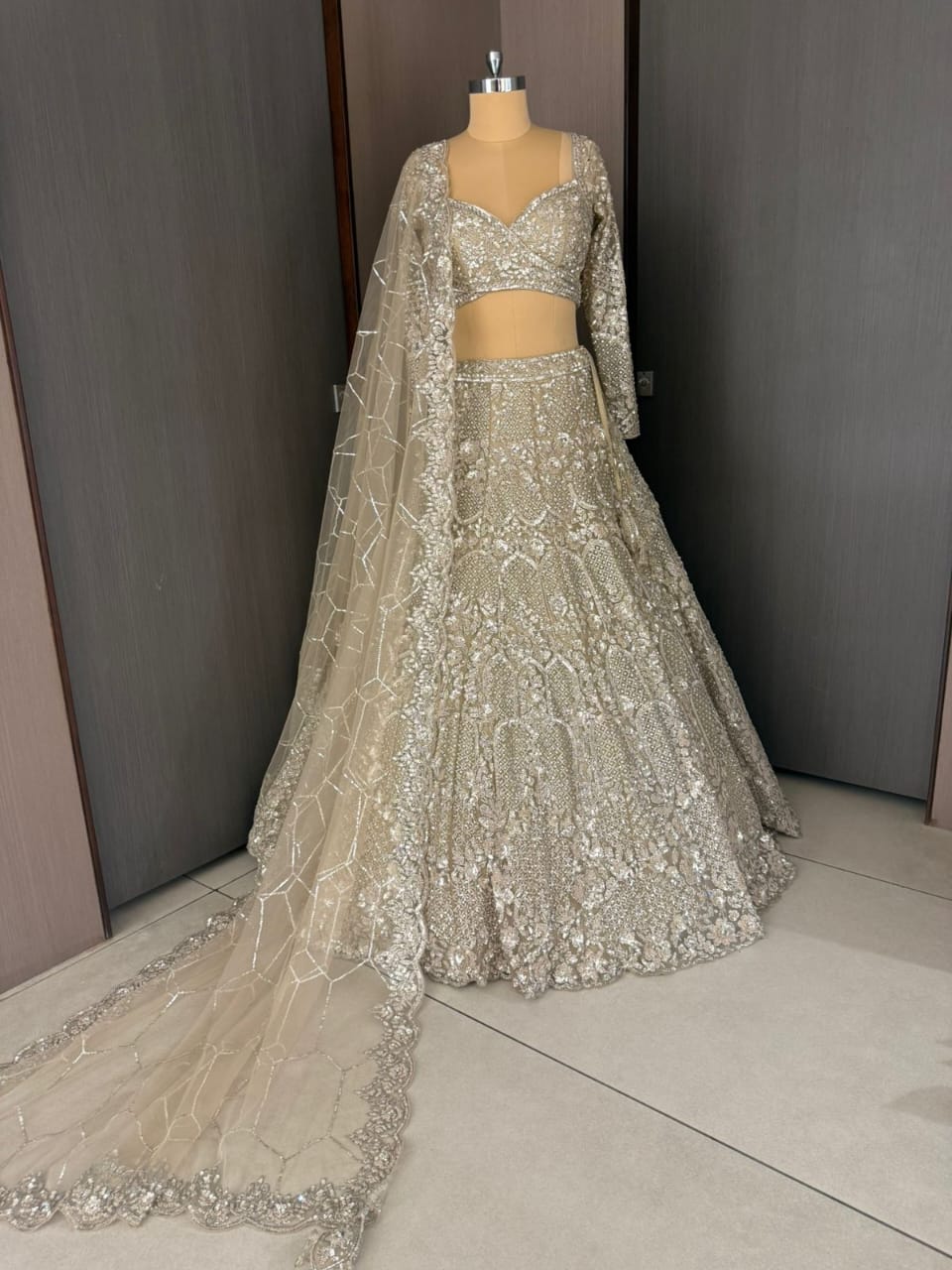 Nyraa Ornate Beige Embroidered Lehenga Choli