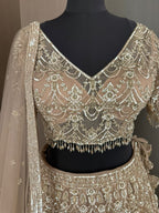 Nyraa Beige & Gold Embroidered Lehenga Choli