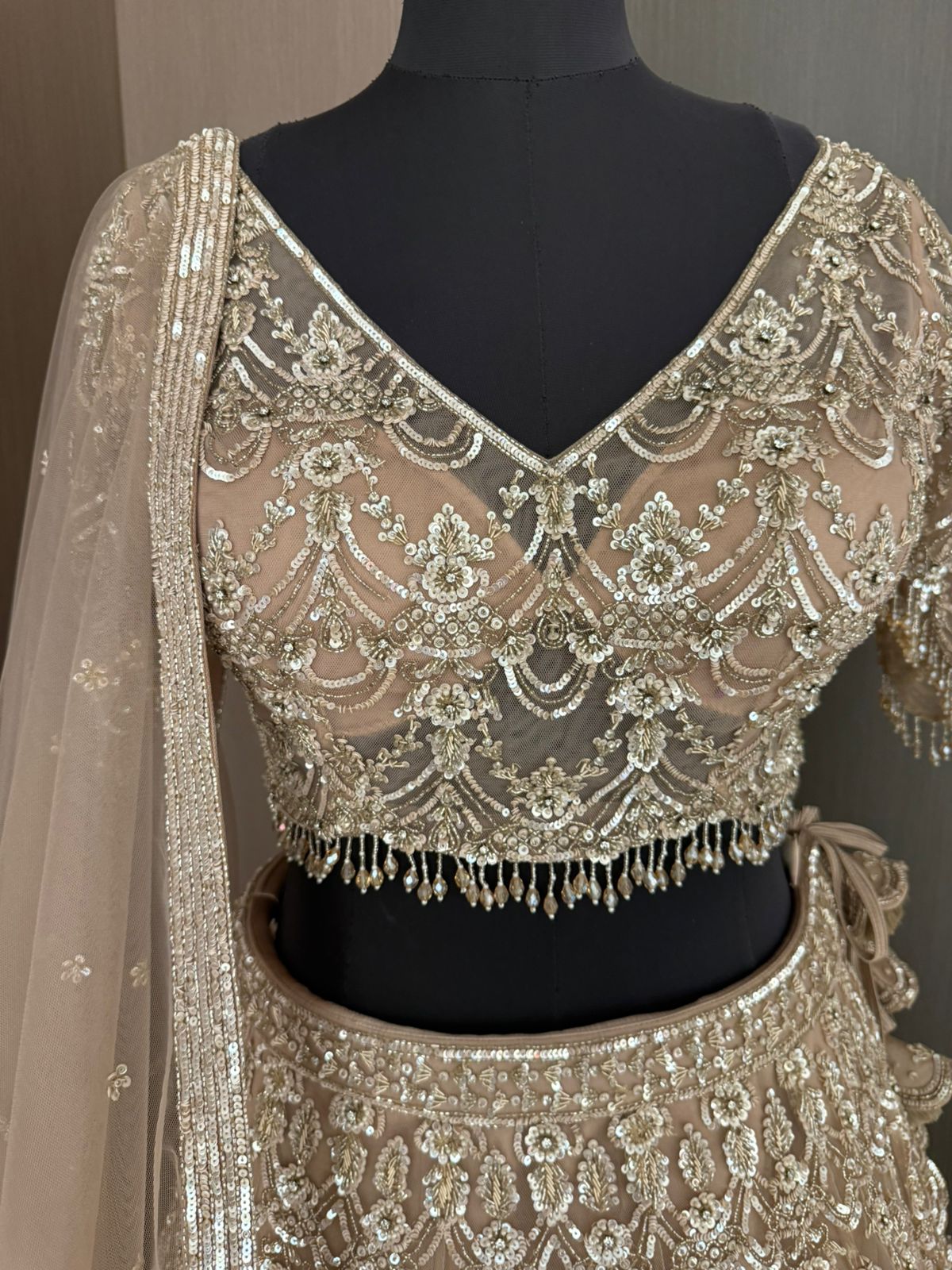 Nyraa Beige & Gold Embroidered Lehenga Choli
