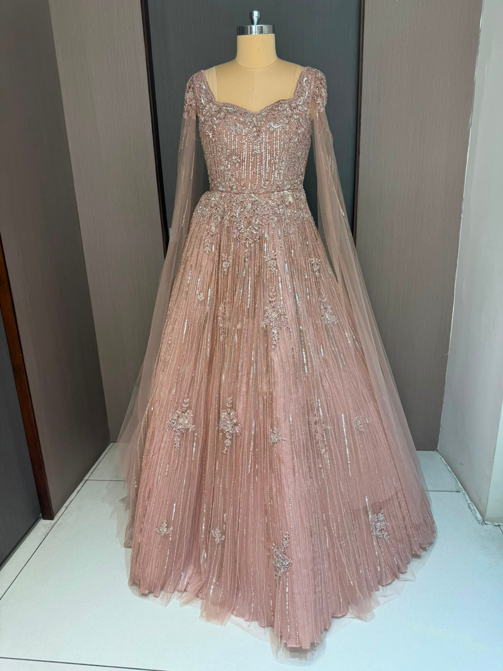 Nyraa Peach Embroidered Gown