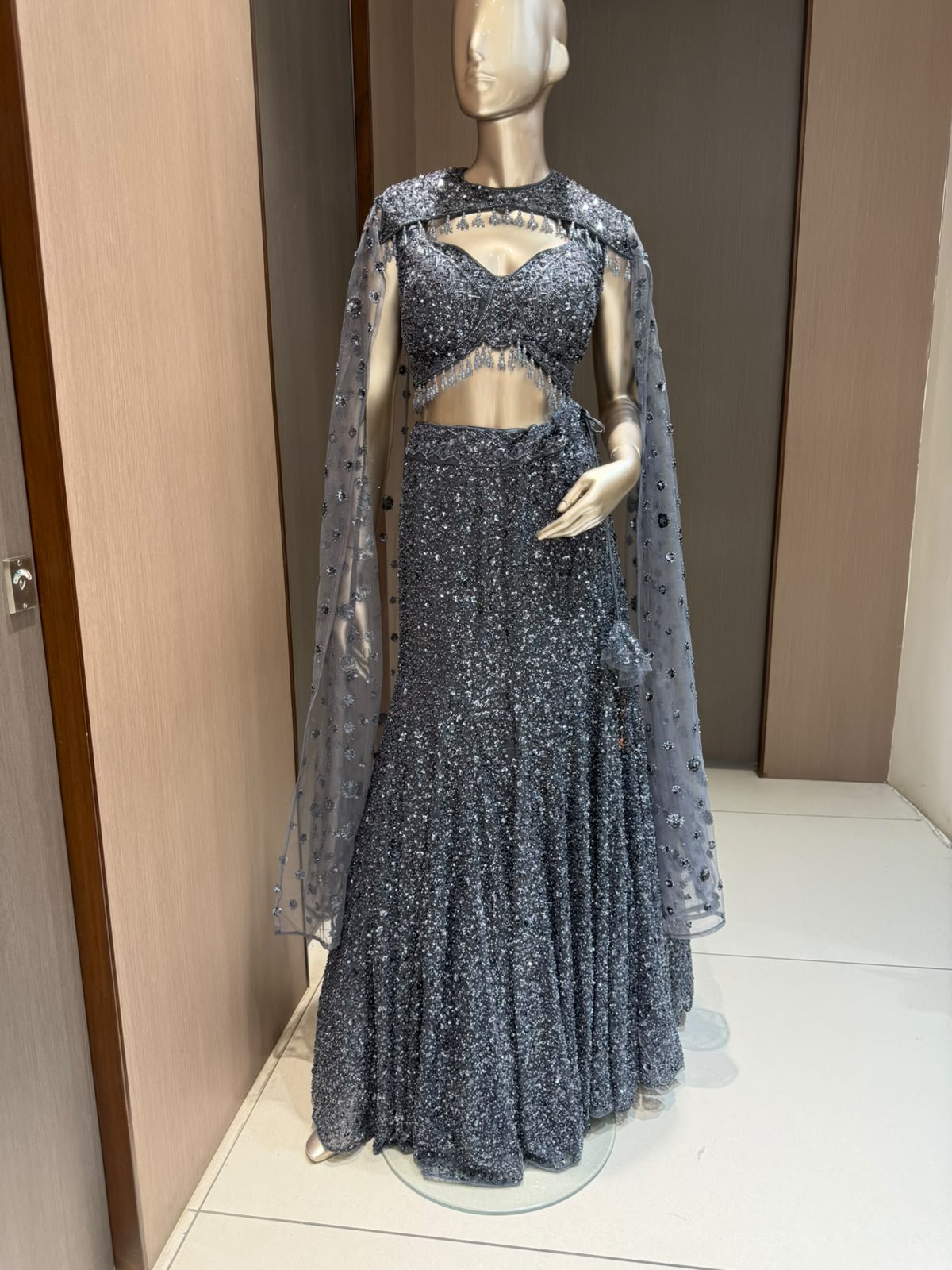 Nyraa Silver Grey Embellished Lehenga Choli with Cape