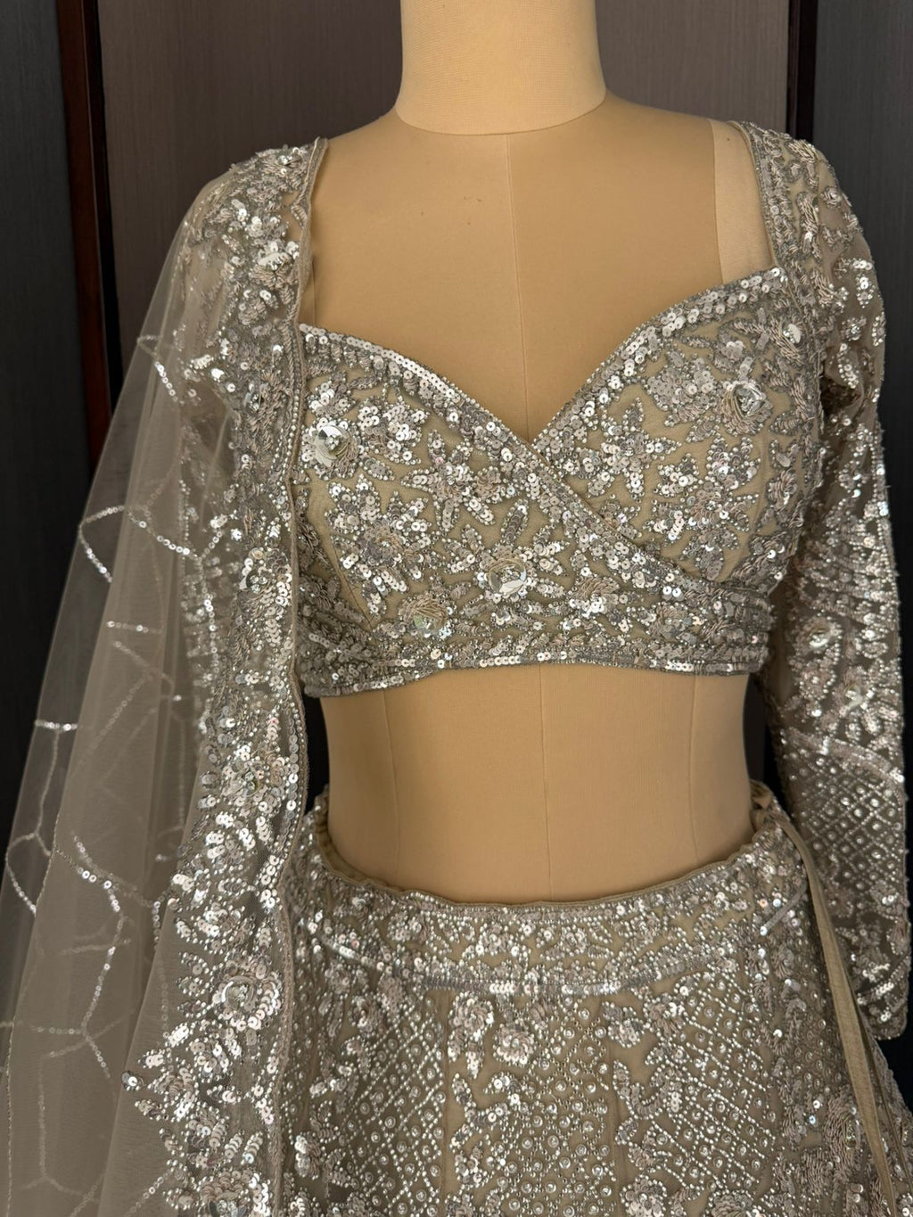 Nyraa Ornate Beige Embroidered Lehenga Choli
