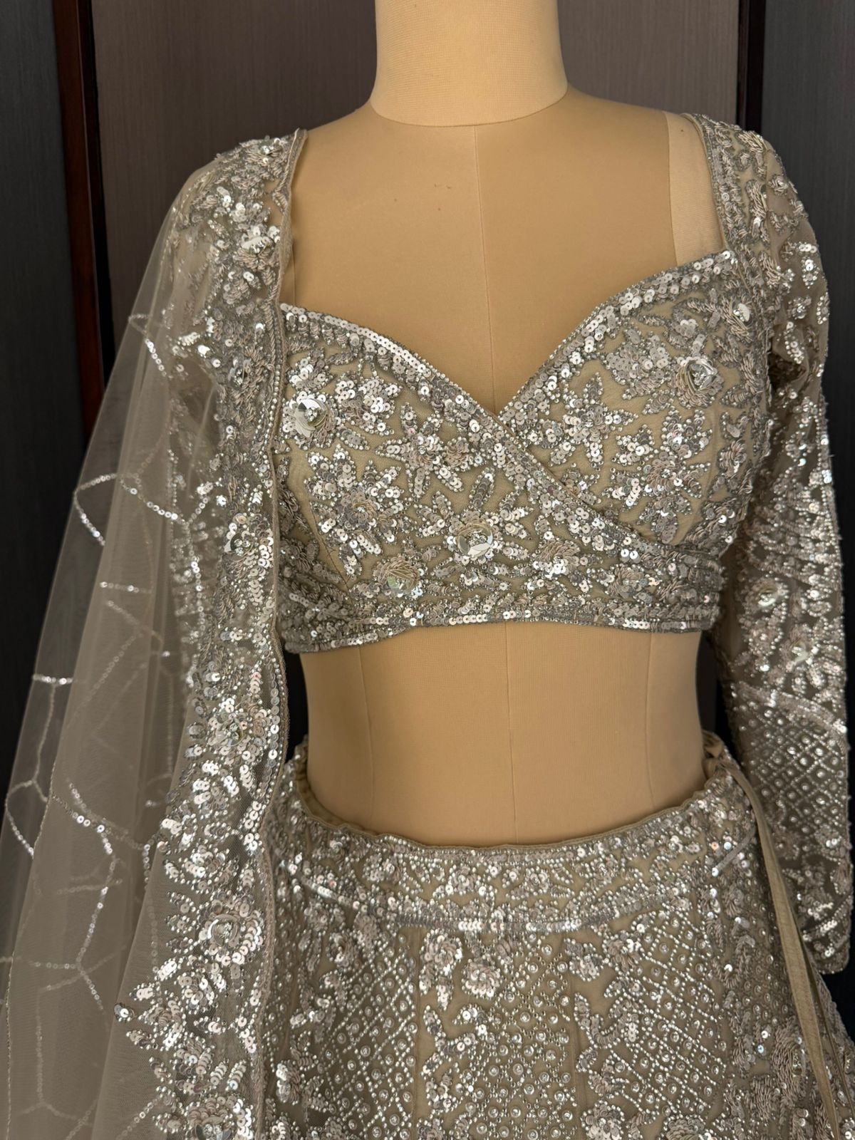 Nyraa Ornate Beige Embroidered Lehenga Choli