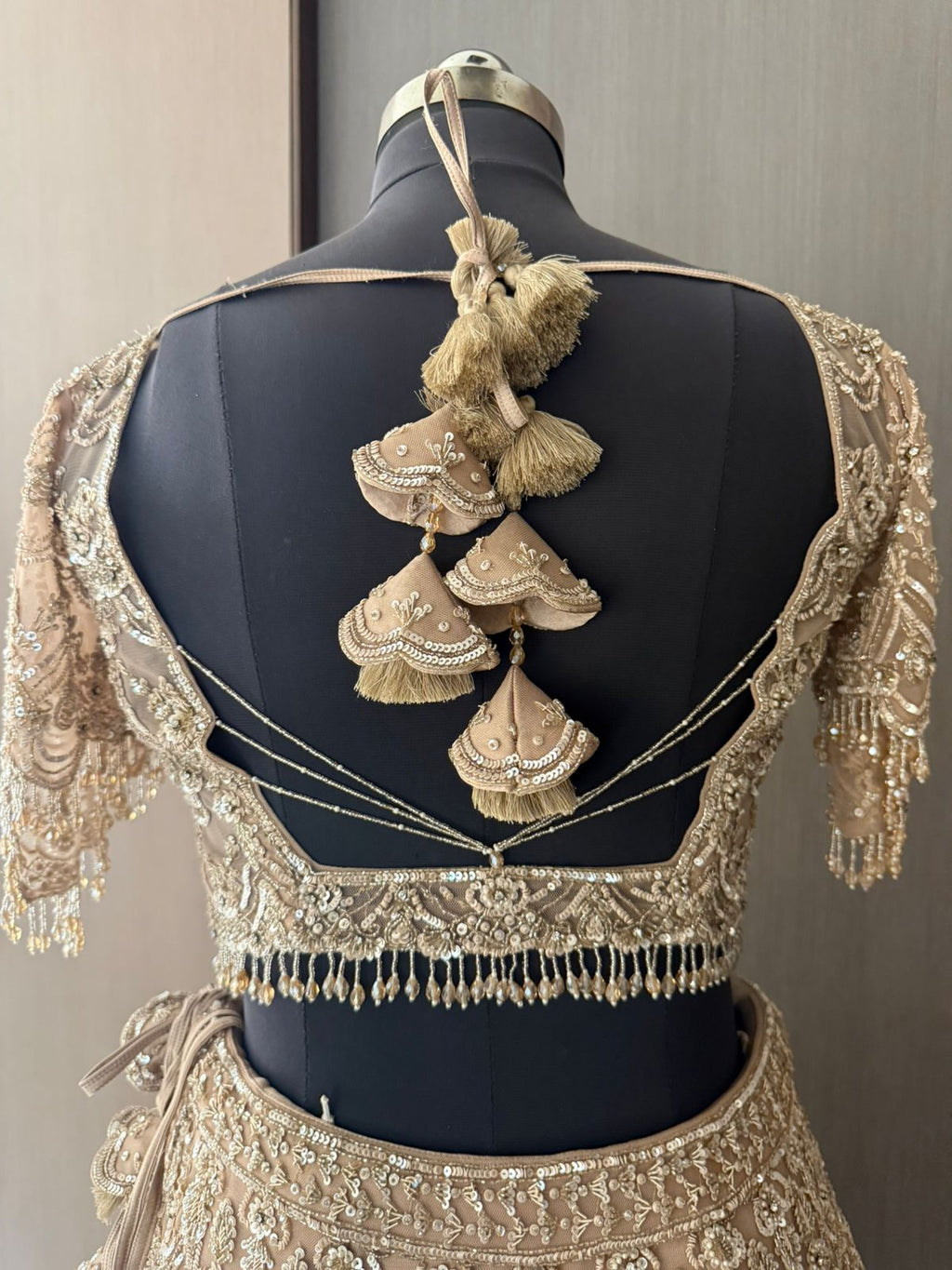 Nyraa Beige & Gold Embroidered Lehenga Choli