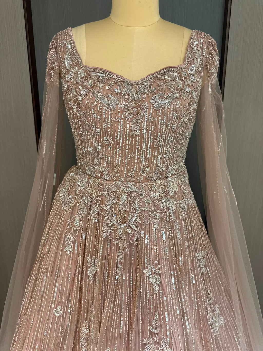 Nyraa Peach Embroidered Gown