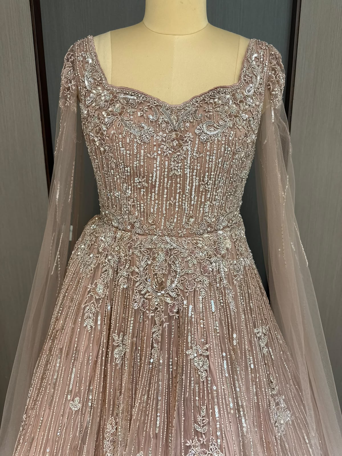 Nyraa Peach Embroidered Gown