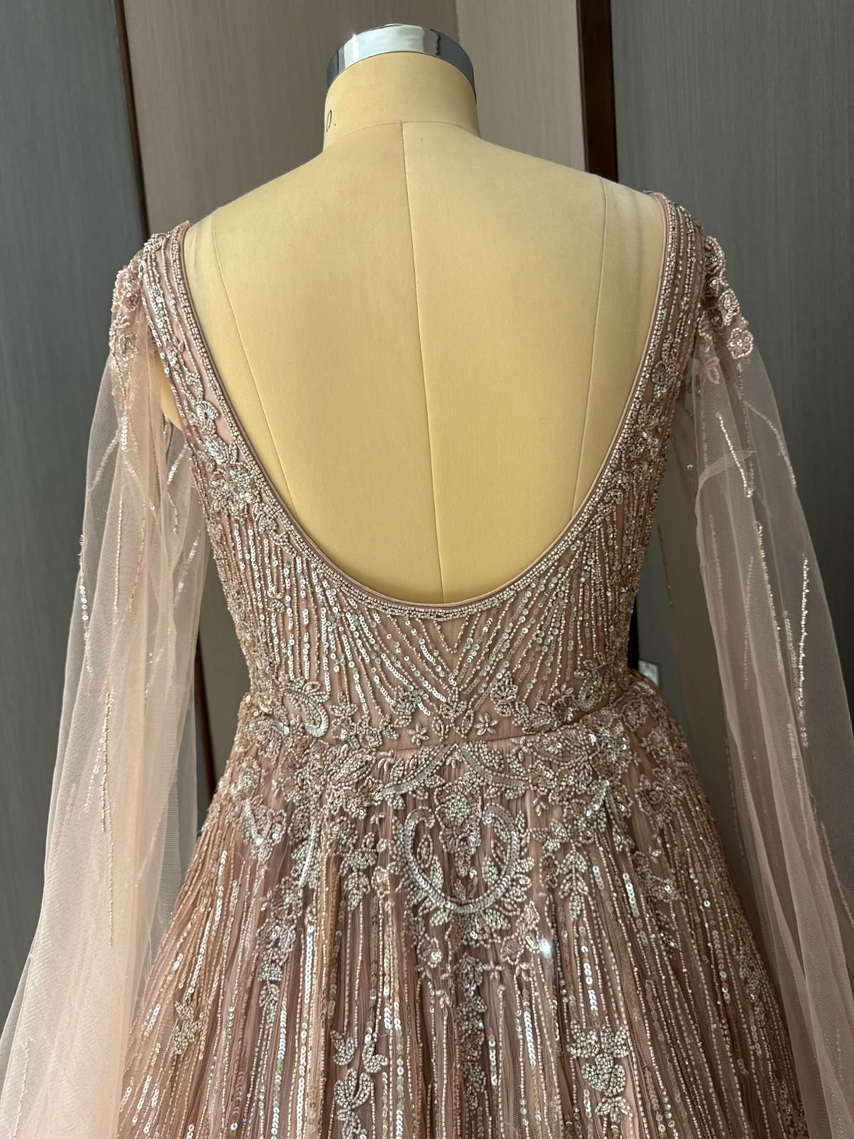 Nyraa Peach Embroidered Gown